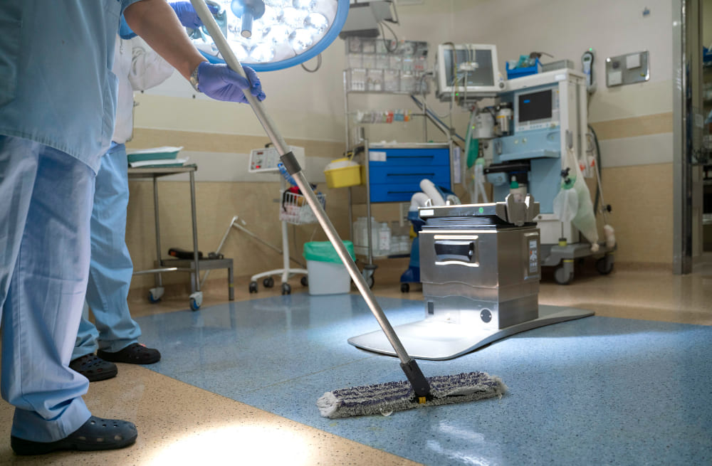 Detailed Pennsylvania Medical Office Cleaning with floor sanitation in a medical operating room.